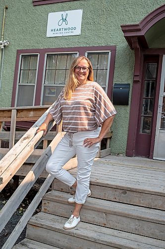 BROOK JONES / FREE PRESS
Katie Inverarity, who is the past chairperson of Heartwood Healing Centre, is pictured in front of the centre at 104 Roslyn Ave., in Winnipeg, Man., Friday, July 19, 2024. The local centre is a non-profit that supports Manitobans who have experienced childhood sexual abuse.