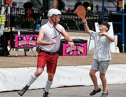 JOHN WOODS / FREE PRESS
Wham Glam Circus Man performs with Finn at the Fringe in Old Market Square Sunday, July 21, 2024. 

Reporter: