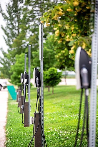 MIKAELA MACKENZIE / FREE PRESS

Rural EV charging stations in the parking lot at the Lower Fort Garry historic site near Saint Andrews on Monday, July 22, 2024. 

For JS story.