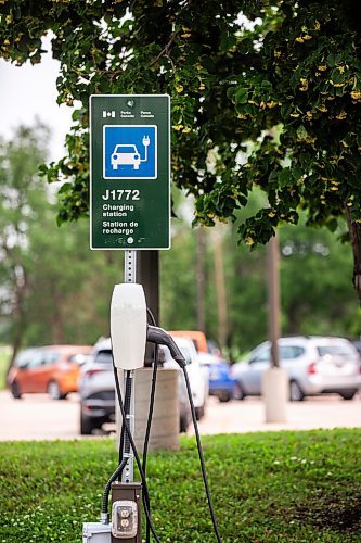 MIKAELA MACKENZIE / FREE PRESS

Rural EV charging stations in the parking lot at the Lower Fort Garry historic site near Saint Andrews on Monday, July 22, 2024. 

For JS story.