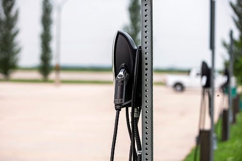 MIKAELA MACKENZIE / FREE PRESS

Rural EV charging stations in the parking lot at the Lower Fort Garry historic site near Saint Andrews on Monday, July 22, 2024. 

For JS story.