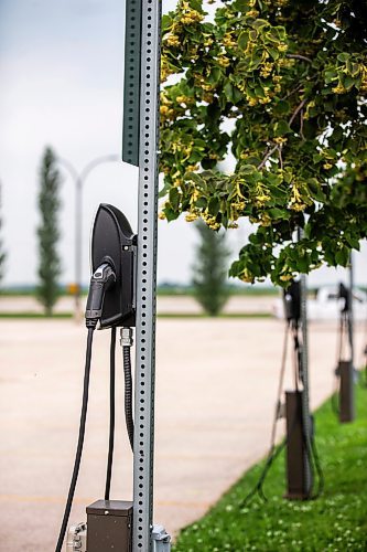 MIKAELA MACKENZIE / FREE PRESS

Rural EV charging stations in the parking lot at the Lower Fort Garry historic site near Saint Andrews on Monday, July 22, 2024. 

For JS story.