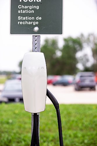 MIKAELA MACKENZIE / FREE PRESS

Rural EV charging stations in the parking lot at the Lower Fort Garry historic site near Saint Andrews on Monday, July 22, 2024. 

For JS story.