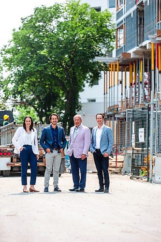 MIKAELA MACKENZIE / FREE PRESS

Sarah Anderson, director of talent management (left), Dan Bockstael, co-president, Carmine Militano, CEO, and Nick Bockstael, co-president, at a Bockstael Construction site at 308 Colony on Friday, July 19, 2024. 

For &#x460;story.