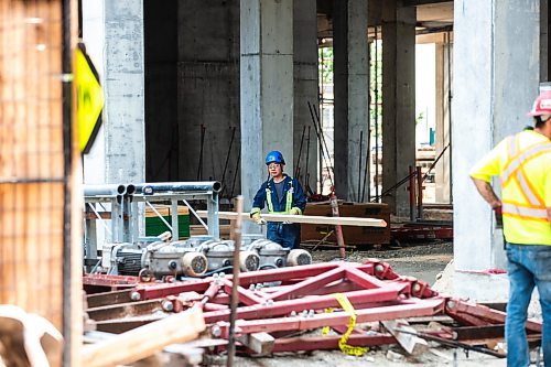 MIKAELA MACKENZIE / FREE PRESS

Jongwon Lee (with Calado) works on a Bockstael Construction site at 308 Colony on Friday, July 19, 2024. 

For &#x460;story.