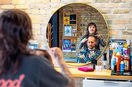 NIC ADAM / FREE PRESS
Cait Bousfield, owner of Good Fortune Barber Shop, speaks about Rubin Block while cutting Jesse Obers hair Monday
240722 - Monday, July 22, 2024.

Reporter: Matt

Jesse Ober