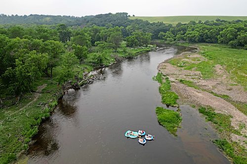 22072024
A group of friends float down the Little Saskatchewan River west of Brandon on a hot and humid Monday afternoon. 
(Tim Smith/The Brandon Sun)default