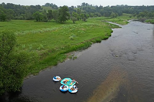 22072024
(L-R) Friends Loren Lobreau, Cassandra Kowalchuk, Jodie Tocher and Luis Alvarenga float down the Little Saskatchewan River west of Brandon on a hot and humid Monday afternoon. 
(Tim Smith/The Brandon Sun)default