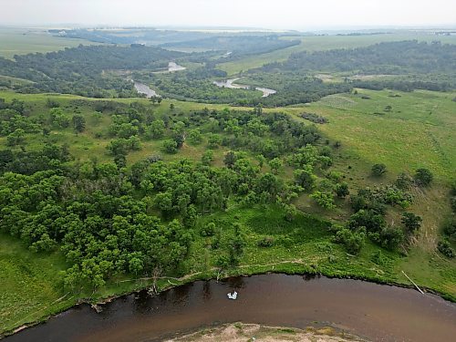 22072024
A group of friends float down the Little Saskatchewan River west of Brandon on a hot and humid Monday afternoon. 
(Tim Smith/The Brandon Sun)default