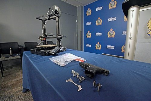 A 3D-printed Glock pistol and a 3D printer seized as part of a probe into a gun manufacturing and trafficking ring. ERIK PINDERA / WINNIPEG FREE PRESS 