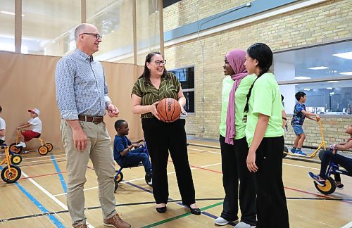 Ruth Bonneville / Free Press

local - Open Y

Photo of Wpg. Mayor Scott Gillingham and Cordella Friesen, President &amp; CEO, YMCA-YWCA of Winnipeg, talking to youth, Nawal Seid (pink scarf)  and Althea Medina about their Y experiences as youth camp councillors after the presser Tuesday.

YWinnipeg, in partnership with the City of Winnipeg announces the introduction of &#x201c;Open Y&#x201d;, a new youth community access program, at press conference at the Downtown YMCA Tuesday. 


See story by Matt

July 22nd,  2024

