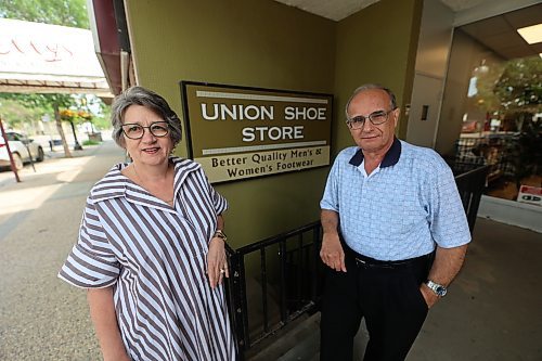 Union Shoe Stores owners Angela and Bob Pappas at the entrance of Union Shoe Stores last Thursday. (Abiola Odutola/The Brandon Sun)