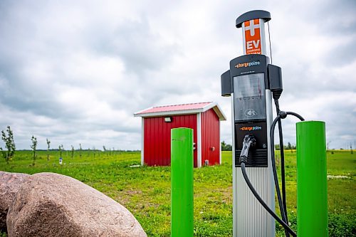 NIC ADAM / FREE PRESS
An EV charger at the Centre of Canada park near Lorette on Hwy 1 pictured Tuesday afternoon.
240723 - Tuesday, July 23, 2024.

Reporter: