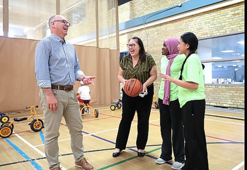 Ruth Bonneville / Free Press

local - Open Y

Photo of Wpg. Mayor Scott Gillingham and Cordella Friesen, President &amp; CEO, YMCA-YWCA of Winnipeg, talking to youth, Nawal Seid (pink scarf)  and Althea Medina about their Y experiences as youth camp councillors after the presser Tuesday.

YWinnipeg, in partnership with the City of Winnipeg announces the introduction of &#x201c;Open Y&#x201d;, a new youth community access program, at press conference at the Downtown YMCA Tuesday. 


See story by Matt

July 22nd,  2024

