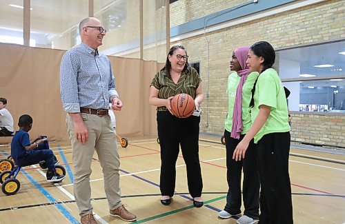 Ruth Bonneville / Free Press

local - Open Y

Photo of Wpg. Mayor Scott Gillingham and Cordella Friesen, President &amp; CEO, YMCA-YWCA of Winnipeg, talking to youth, Nawal Seid (pink scarf)  and Althea Medina about their Y experiences as youth camp councillors after the presser Tuesday.

YWinnipeg, in partnership with the City of Winnipeg announces the introduction of &#x201c;Open Y&#x201d;, a new youth community access program, at press conference at the Downtown YMCA Tuesday. 


See story by Matt

July 22nd,  2024

