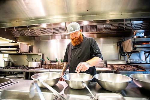 MIKAELA MACKENZIE / FREE PRESS

Chef Shaun Prevost makes chicken fingers at Rudy's Eat &amp; Drink on Tuesday, July 23, 2024. 

For Dave Sanderson story.