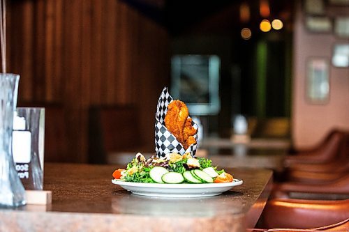 MIKAELA MACKENZIE / FREE PRESS

Chicken fingers and a side salad at Rudy's Eat &amp; Drink on Tuesday, July 23, 2024. 

For Dave Sanderson story.