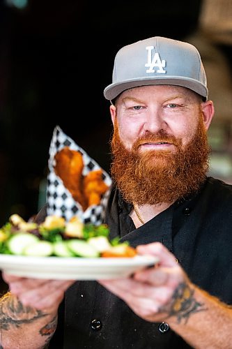 MIKAELA MACKENZIE / FREE PRESS

Chef Shaun Prevost with chicken fingers at Rudy's Eat &amp; Drink on Tuesday, July 23, 2024. 

For Dave Sanderson story.