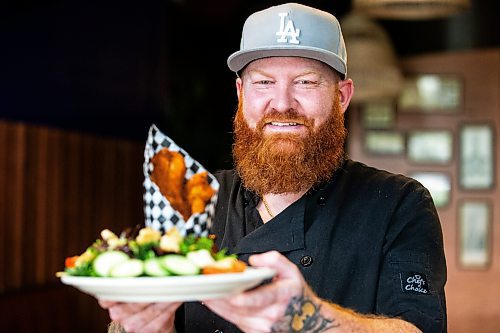 MIKAELA MACKENZIE / FREE PRESS

Chef Shaun Prevost with chicken fingers at Rudy's Eat &amp; Drink on Tuesday, July 23, 2024. 

For Dave Sanderson story.