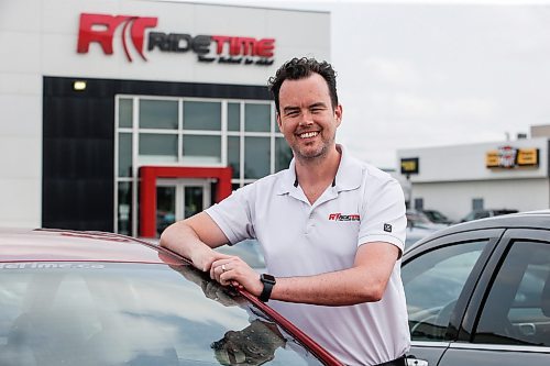 JOHN WOODS / FREE PRESS
Andrew MacIvert, co-owner of Ride Time, an independent used car dealership, is photographed at their car lot on Oak Point Highway in Winnipeg Tuesday, July 23, 2024. The industry is experiencing a drop in the average price of higher-end used cars.

Reporter: martin