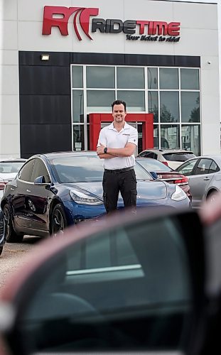 JOHN WOODS / FREE PRESS
Andrew MacIvert, co-owner of Ride Time, an independent used car dealership, is photographed at their car lot on Oak Point Highway in Winnipeg Tuesday, July 23, 2024. The industry is experiencing a drop in the average price of higher-end used cars.

Reporter: martin