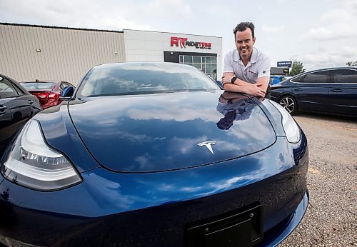 JOHN WOODS / FREE PRESS
Andrew MacIvert, co-owner of Ride Time, an independent used car dealership, is photographed at their car lot on Oak Point Highway in Winnipeg Tuesday, July 23, 2024. The industry is experiencing a drop in the average price of higher-end used cars.

Reporter: martin