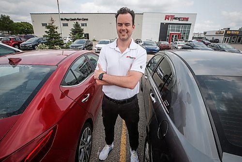 JOHN WOODS / FREE PRESS
Andrew MacIvert, co-owner of Ride Time, an independent used car dealership, is photographed at their car lot on Oak Point Highway in Winnipeg Tuesday, July 23, 2024. The industry is experiencing a drop in the average price of higher-end used cars.

Reporter: martin