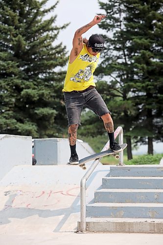 23072024
Brendon Sanderson of Winnipeg lipslides a rail at the Sioux Valley Dakota Nation skatepark on Tuesday during a skateboarding demo put on by Brandon&#x2019;s Recovery Skateshop as part of the first day of the inaugural Dakota FACTS Camp. The camp is aimed primarily at Dakota youth between the ages of 13-18 and consists of a variety of events, teachings, entertainment and sports around the themes of Food, Agriculture, Climate Change, Tradition and Synergies (FACTS). The camp runs until Thursday.  (Tim Smith/The Brandon Sun)
