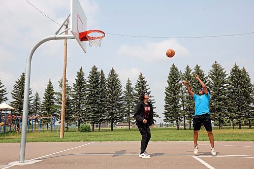 23072024
Knowledge Branth and Cole White play basketball together during the first day of the inaugural Dakota FACTS Camp at Sioux Valley Dakota Nation on Tuesday. The camp is aimed primarily at Dakota youth between the ages of 13-18 and consists of a variety of events, teachings, entertainment and sports around the themes of Food, Agriculture, Climate Change, Tradition and Synergies (FACTS). The camp runs until Thursday.  (Tim Smith/The Brandon Sun)
