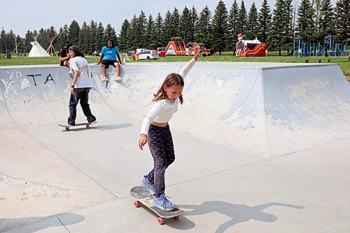 23072024
Lily Breanne of Sioux Valley Dakota Nation tries skateboarding at the SVDN skatepark on Tuesday during a skateboarding demo put on by Brandon&#x2019;s Recovery Skateshop as part of the first day of the inaugural Dakota FACTS Camp. The camp is aimed primarily at Dakota youth between the ages of 13-18 and consists of a variety of events, teachings, entertainment and sports around the themes of Food, Agriculture, Climate Change, Tradition and Synergies (FACTS). The camp runs until Thursday.  (Tim Smith/The Brandon Sun)
