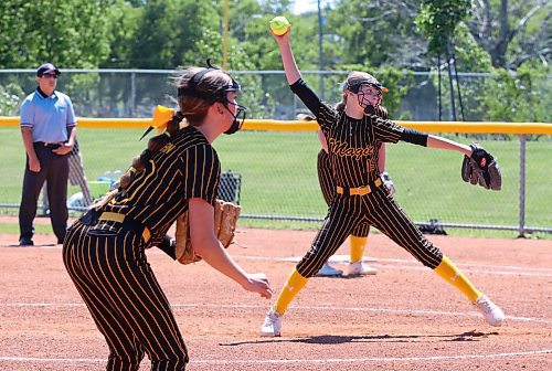 U13 Westman Magic pitcher Kaedyn Leslie (19) delivers to the plate earlier this season under the watchful eye of third baseman Brooke Hartman. (Photos by Perry Bergson/The Brandon Sun)
 
