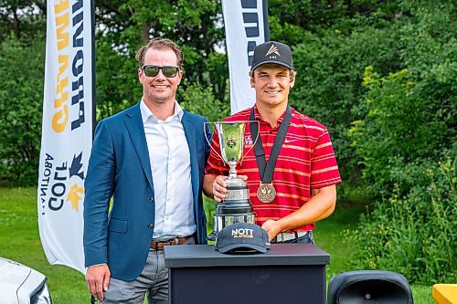 NIC ADAM / FREE PRESS
Braxton Kuntz (right), of Breezy Bend Country Club, pictured with his trophy and Golf MB board member Justin Price after the Manitoba men's amateur championship at Rossmere Golf & Country Club Wednesday.
240724 - Wednesday, July 24, 2024.

Reporter: Mike McIntyre