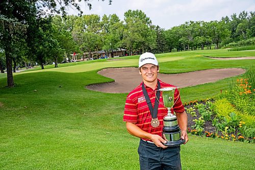 NIC ADAM / FREE PRESS
Braxton Kuntz, of Breezy Bend Country Club, pictured with his trophy after winning the Manitoba men's amateur championship at Rossmere Golf &amp; Country Club Wednesday.
240724 - Wednesday, July 24, 2024.

Reporter: Mike McIntyre