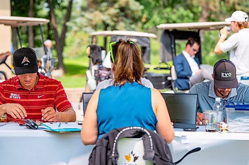 NIC ADAM / FREE PRESS
Braxton Kuntz (left), of Breezy Bend Country Club, and Drew Jones (right), of Shilo Country Club, at the scoring area after Kuntz won the Manitoba men's amateur championship at Rossmere Golf &amp; Country Club Wednesday.
240724 - Wednesday, July 24, 2024.

Reporter: Mike McIntyre