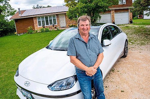 NIC ADAM / FREE PRESS
Kent Heinrich pictured alongside his 2024 Hyundai Ioniq 6 on Wednesday afternoon.
240717 - Wednesday, July 17, 2024.

Reporter: ?