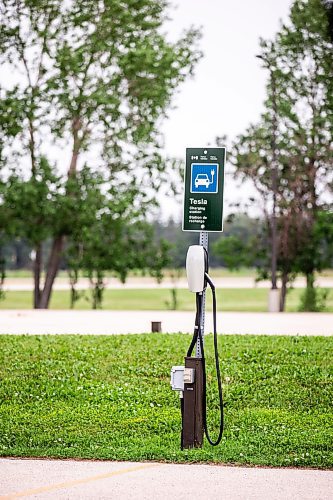 MIKAELA MACKENZIE / FREE PRESS

Rural EV charging stations in the parking lot at the Lower Fort Garry historic site near Saint Andrews on Monday, July 22, 2024. 

For JS story.