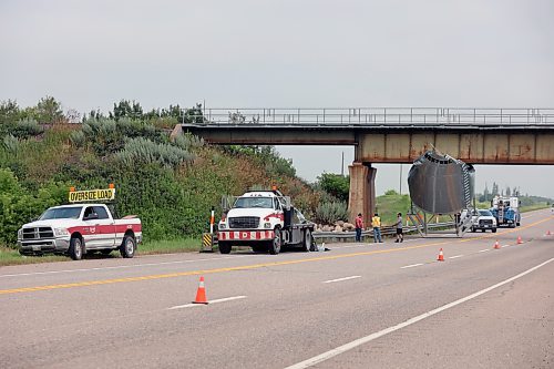 RCMP, CN Police and Manitoba Transportation and Infrastructure all responded to an incident on Highway 10, just north of Forrest, on Thursday morning where a grain bin passing under a rail overpass got stuck. (Colin Slark/The Brandon Sun)