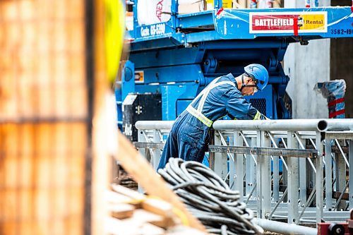 MIKAELA MACKENZIE / FREE PRESS

Jongwon Lee (with Calado) works on a Bockstael Construction site at 308 Colony on Friday, July 19, 2024. 

For &#x460;story.