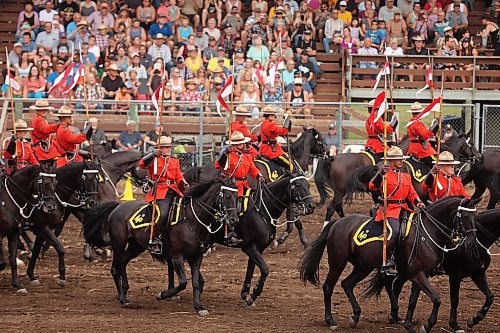 Members of the RCMP Musical Ride perform on Thursday evening. (Tim Smith/The Brandon Sun)