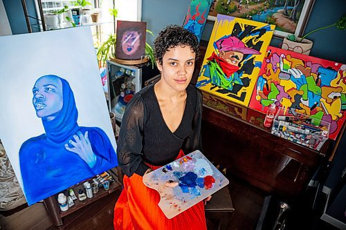 NIC ADAM / FREE PRESS
Black Artists Winnipeg&#x2019;s Olivia Cassie pictured in her home studio Thursday. Cassie is organizing the Black Garden event at Winnipeg Art Gallery Qaumajuq where her work, as well as others, will be on display.
240725 - Thursday, July 25, 2024.

Reporter: Thandi