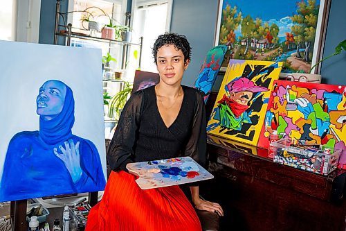 NIC ADAM / FREE PRESS
Black Artists Winnipeg&#x2019;s Olivia Cassie pictured in her home studio Thursday. Cassie is organizing the Black Garden event at Winnipeg Art Gallery Qaumajuq where her work, as well as others, will be on display.
240725 - Thursday, July 25, 2024.

Reporter: Thandi