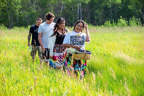 MIKAELA MACKENZIE / FREE PRESS

Dana Connolly (front) gathers sage with her family at Assiniboine Forest on Thursday, July 25, 2024. The family is behind Mashkiki Garden Creations, which sells natural beauty and wellness products infused with Manitoba prairie plants.

For AV story.