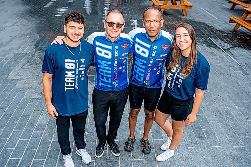 NIC ADAM / FREE PRESS
True North Sports senior vice president Kevin Donnelly (centre left) and U-Turn Parkinson's Founder Tim Hague (centre right) pictured alongside their children Chris Donnelley (left) and Jordanna Hague, who will be getting married in September 2025, at True North Square Thursday morning.
240725 - Thursday, July 25, 2024.

Reporter: Sabrina