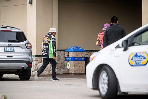 Mike Sudoma/Free Press
Families walk into a hotel where fire evacuees from Marcel Colomb First Nation register to receive aid from Red Cross Friday afternoon
July 26, 2024
