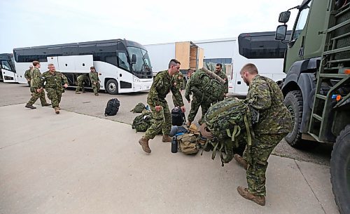 Soldiers with the 2nd Battalion, Princess Patricia's Canadian Light Infantry at CFB Shilo pack up their backpacks and other equipment for the journey west to Alberta on Friday morning. The company of about 75 troops has been deployed to help battle the raging wildfires in Alberta that most recently destroyed nearly half of the community of Jasper. (Matt Goerzen/The Brandon Sun)