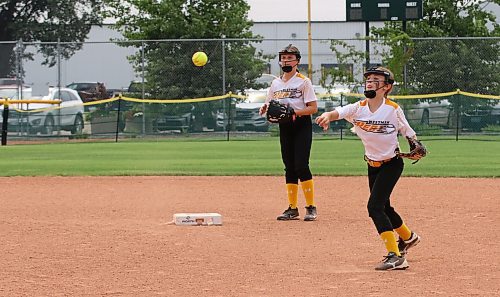 Under-11 Westman Heat White second baseman Tenley Figol throws out a runner at first base as shortstop Molly Roberts looks on during a game against the Bonivital Bolts on the opening day of Softball Manitoba's U11 AA provincials at Ashley Neufeld Softball Complex on Friday. Westman won 8-0. (Perry Bergson/The Brandon Sun)
July 26, 2024