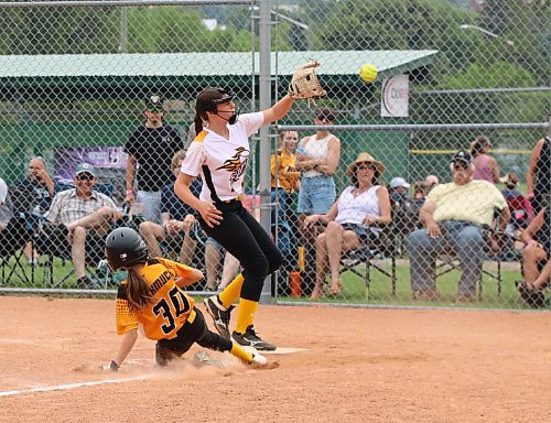 Under-13 Westman Heat base runner Ayven Chuchmuch slides safely into the plate as Westman Fury pitcher Myra Ramsey catches a desperate attempt to throw her out after a wild pitch during their game in Softball Manitoba's U13 AA provincials at Ashley Neufeld Softball Complex on Friday. The Heat won 7-5. (Perry Bergson/The Brandon Sun)
July 26, 2024