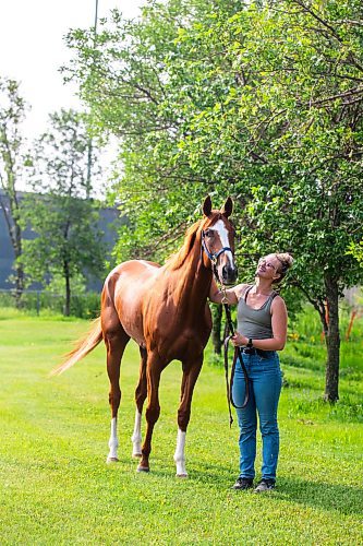 MIKAELA MACKENZIE / FREE PRESS

Groom Katie Morris with Manitoba Derby contender No Show No Call at the Assiniboia Downs on Friday, July 26, 2024. 

For George story.