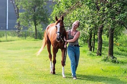 MIKAELA MACKENZIE / FREE PRESS

Groom Katie Morris with Manitoba Derby contender No Show No Call at the Assiniboia Downs on Friday, July 26, 2024. 

For George story.