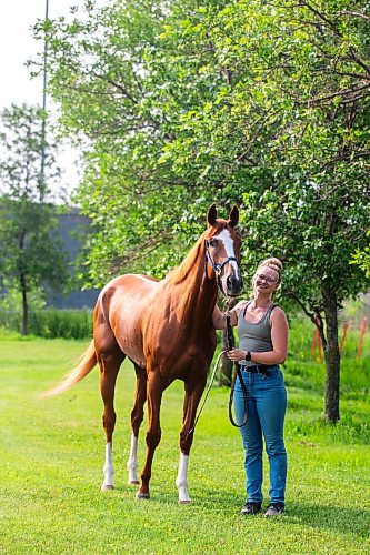 MIKAELA MACKENZIE / FREE PRESS

Groom Katie Morris with Manitoba Derby contender No Show No Call at the Assiniboia Downs on Friday, July 26, 2024. 

For George story.